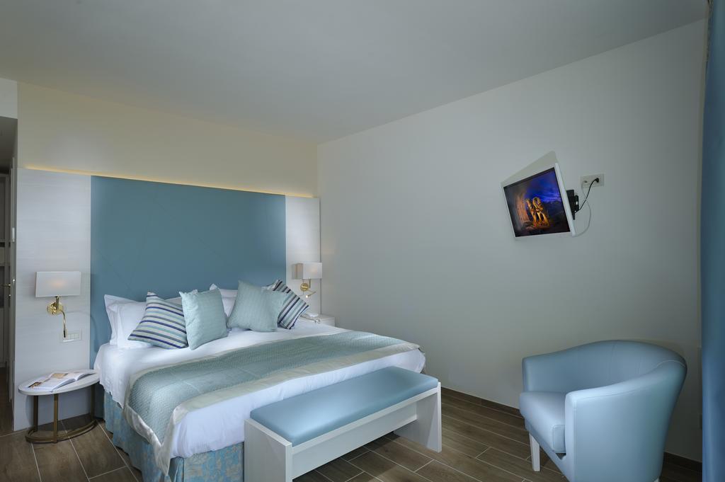 Hotel Montecarlo Бибионе Номер фото